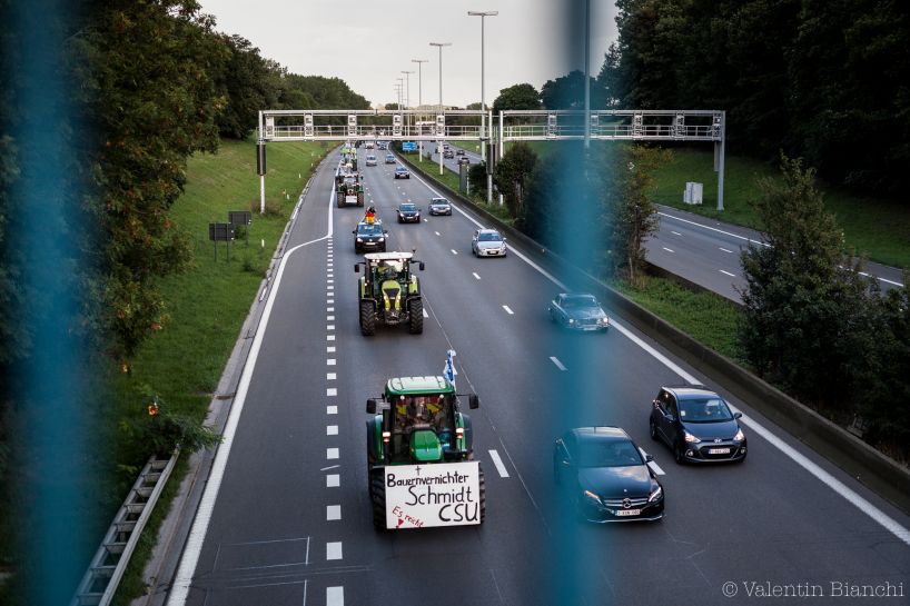 Column of tractors on the E40 highway towards Brussels, Belgium. A huge european protest with farmers from Europe will take place the day after. More than 2000 tractors are expected in Brussels. September 6th, 2015. © Valentin Bianchi